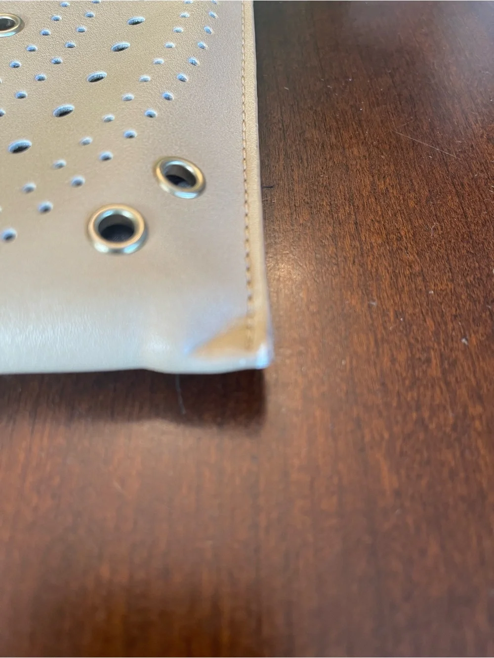 New Directions perforated clutch bag Tan